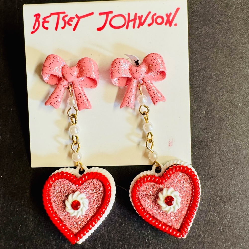 NWT Betsey Johnson Babycakes pink and red heart dangle earrings with bows.